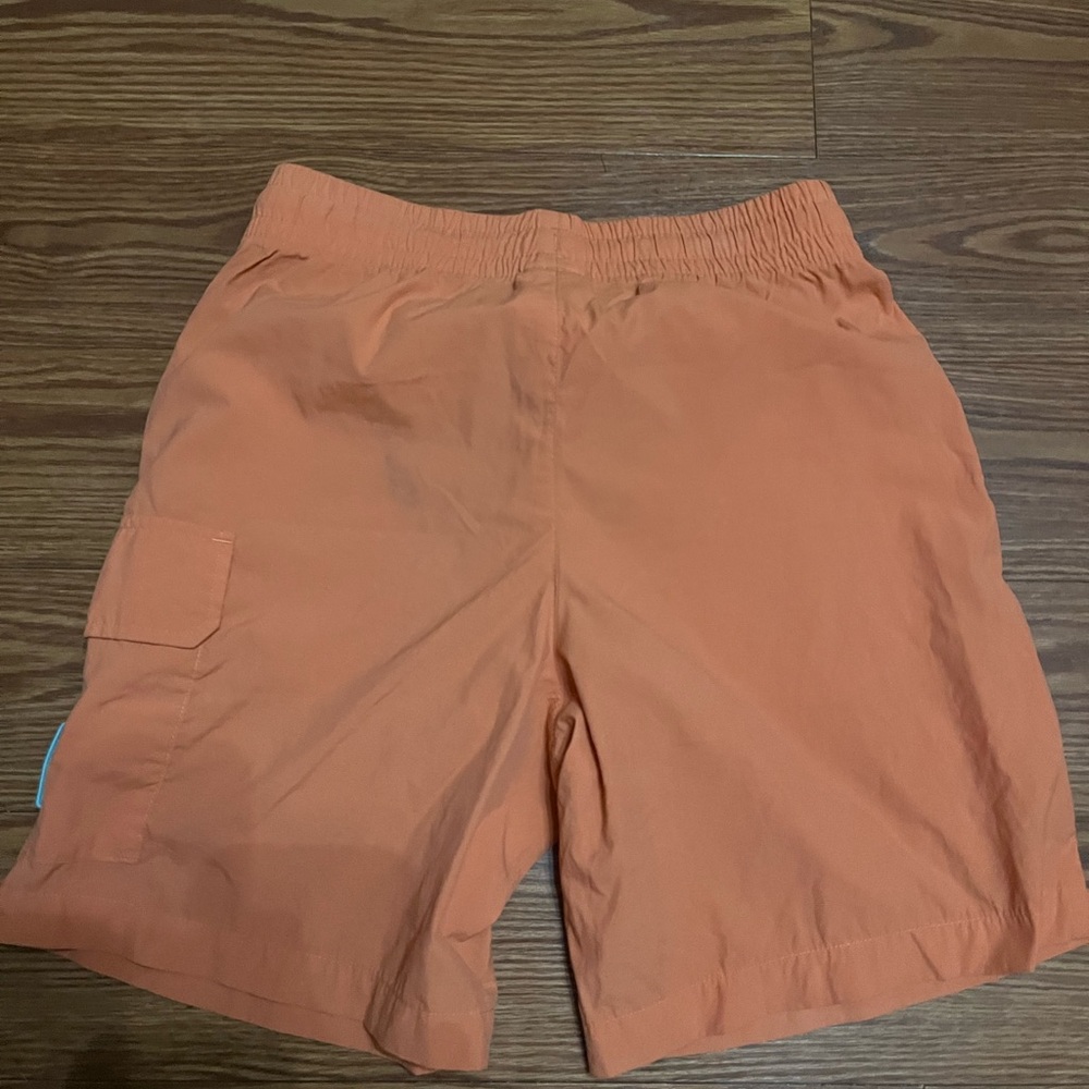 New Balance Men's Cargo Running Shorts in Orange Small
